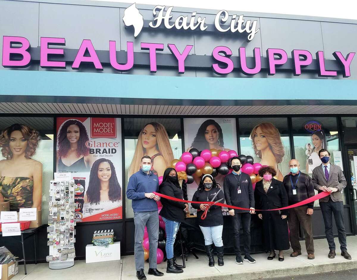 Hair City Beauty Supply, 533 Washington St., held a grand opening Nov. 19, 2020. From left, Middlesex County Chamber of Commerce Vice President Jeffrey Pugliese, wig manager Katria Askew, general manager ShaRhonda Cherry, owner Ken Jiyong Song, Chamber Central Business Bureau Chairwoman Pamela Steele, Middletown Economic Development Specialist Thomas Marano, and Mayor Ben Florsheim were in attendance.