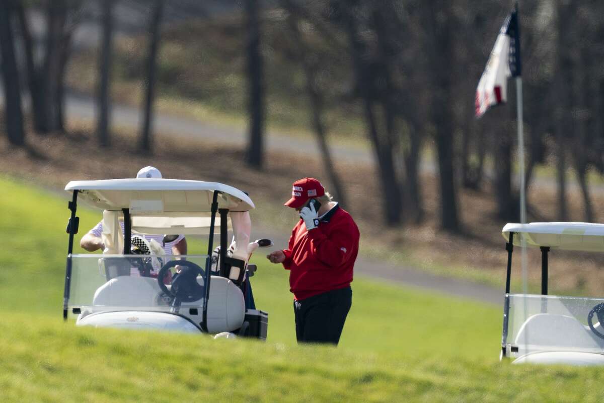 President Trump plays golf at the Trump National Golf Club in Sterling, Va., on Thanksgiving.