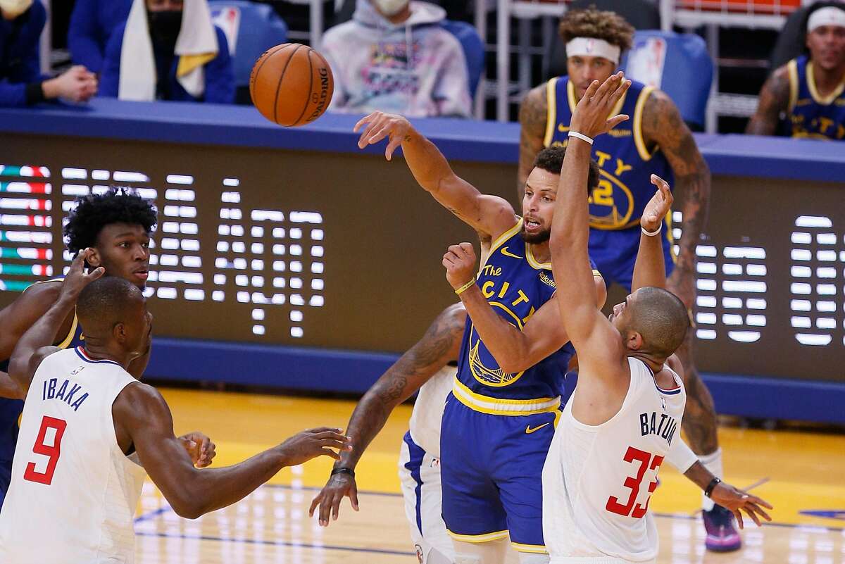 Golden State Warriors guard Stephen Curry (30) turns the ball over in the second quarter during an NBA game against the LA Clippers at Chase Center, Friday, Jan. 8, 2021, in San Francisco, Calif.