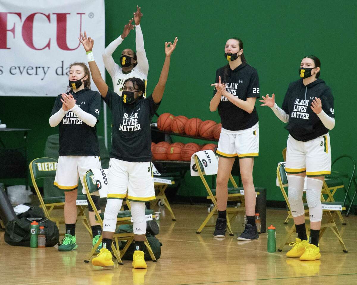 The Siena College bench cheers on their teammates during a Metro Atlantic Athletic Conference game against Rider University at the Alumni Recreation Center on the Siena campus in Loudonville, NY, on Saturday, Jan. 9, 2020 (Jim Franco/special to the Times Union.)