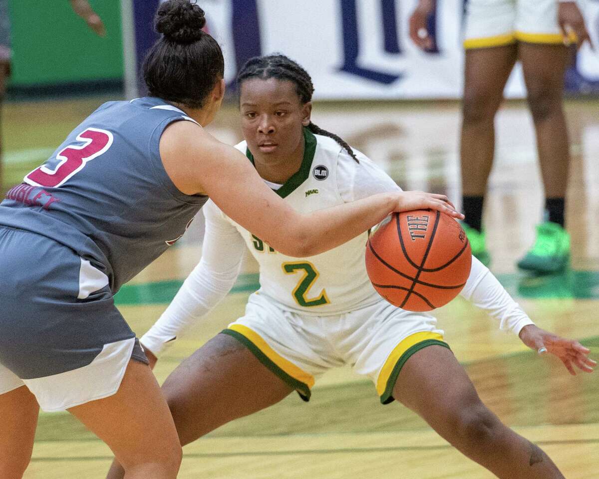 Siena College junior Amari Anthony plays defense against Rider University junior Amanda Mobley during a Metro Atlantic Athletic Conference game at the Alumni Recreation Center on the Siena campus in Loudonville, NY, on Saturday, Jan. 9, 2020 (Jim Franco/special to the Times Union.)