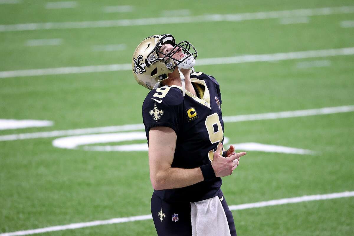 Quarterback Drew Brees celebrates after the New Orleans Saints defeated the Chicago Bears 21-9 in the Superdome.