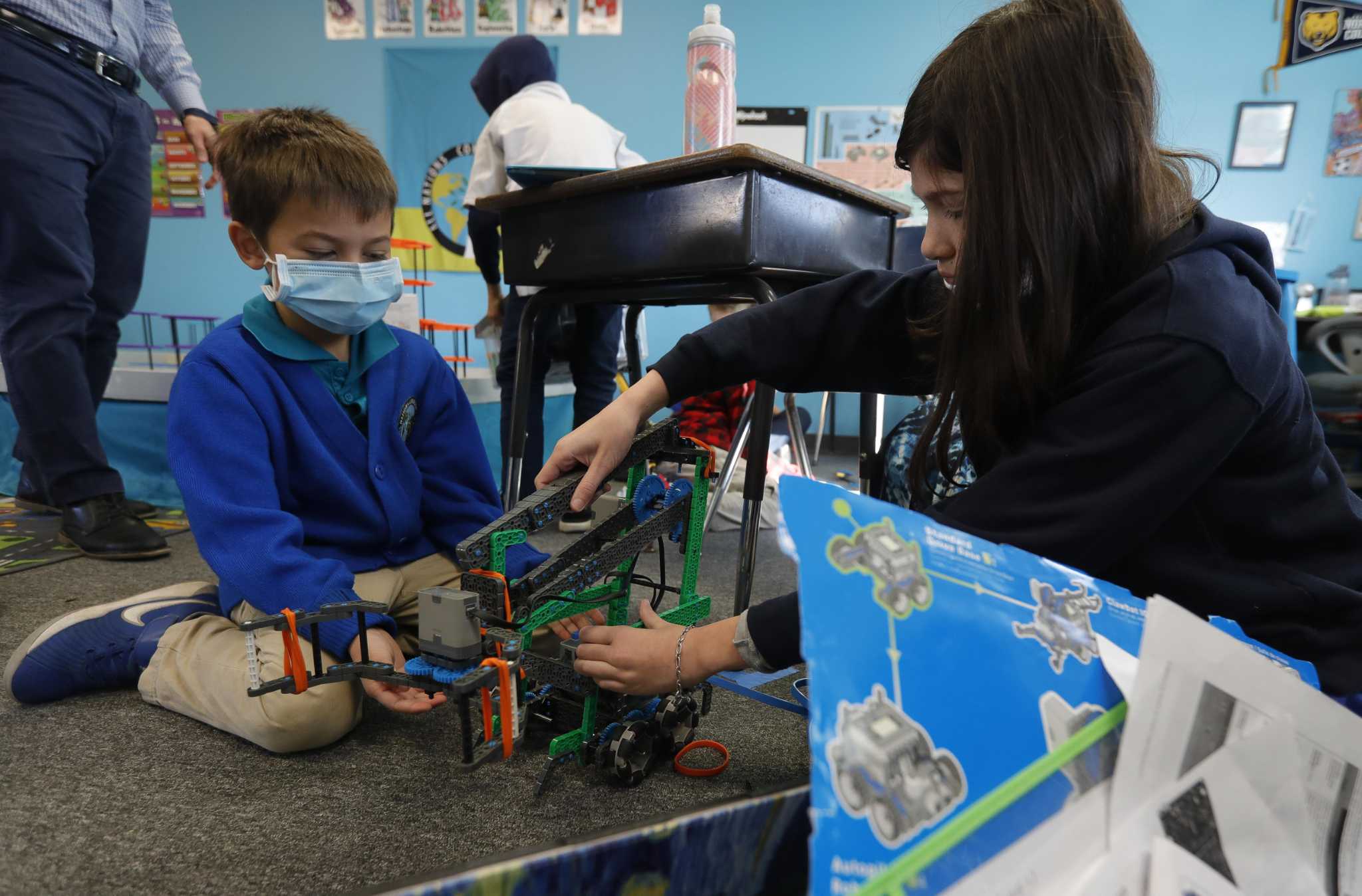Students Using Robotics Schools team up on robotics so every student gets a chance