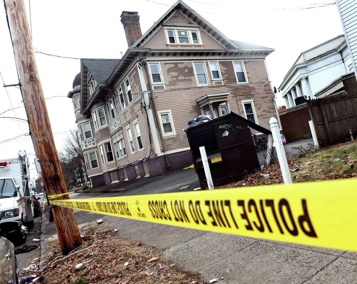 New Haven Police on the scene of a double homicide at the corner of Winthrop Avenue and Chapel Street in New Haven on January 11, 2021.