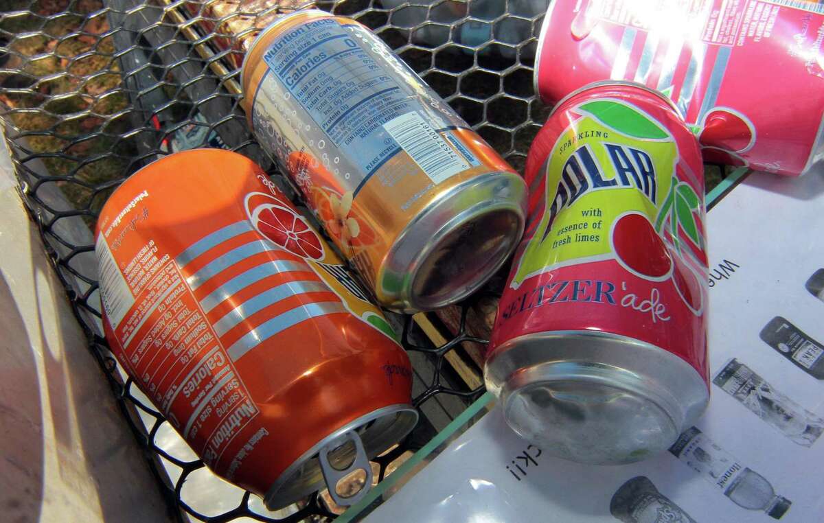 Boy Scout Troop 25 holds its monthly redeemable bottle and can drive at First United Methodist Church in Shelton, Conn., on Saturday Jan. 9, 2021. The event, which helps raise money for scouting activities, is held each first Saturday of each month from 10 a.m. to 1 p.m.