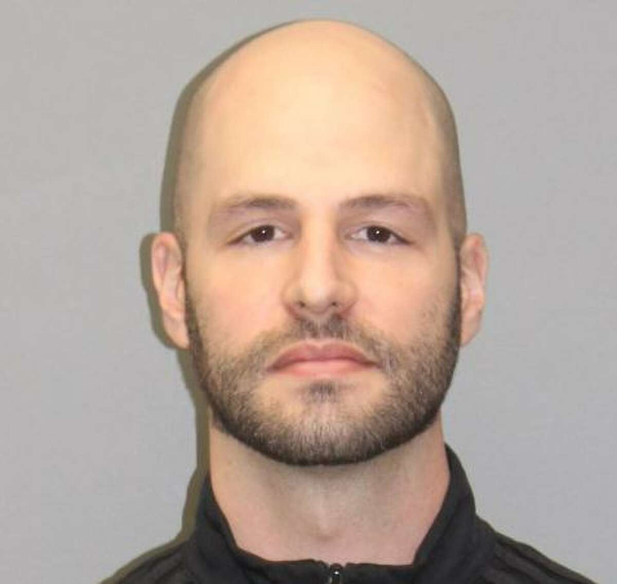 Adam Randazzo, 35, of Barbara Road in South Windsor, Conn., with eight counts of illegal possession of a high-capacity magazine when he turned himself in at police headquarters around 6 p.m. Monday, Jan. 11, 2021.