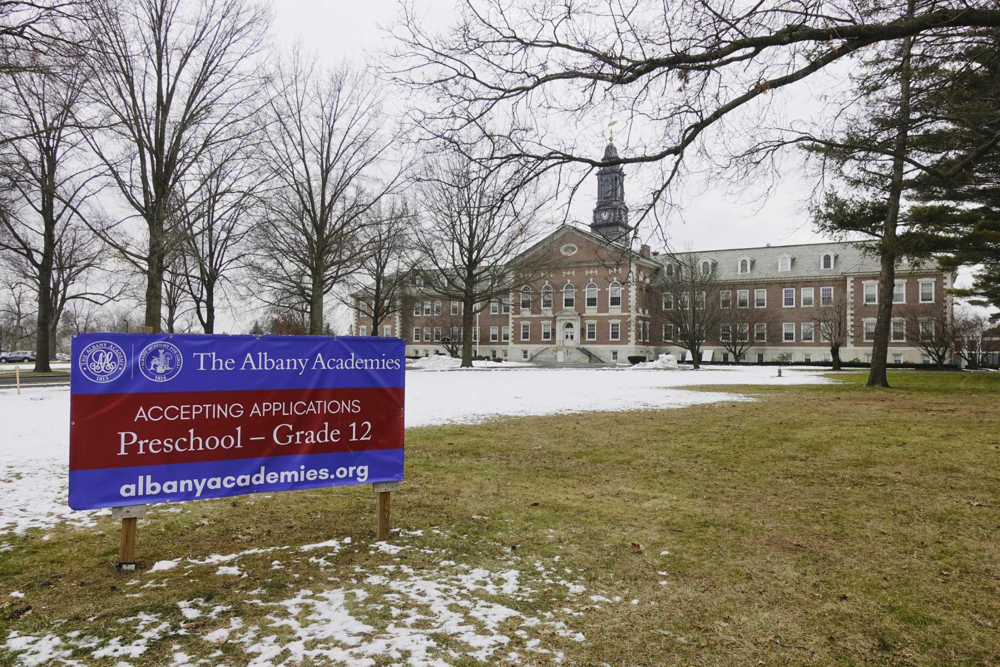 Albany Academies to cut staff, make most grades coed