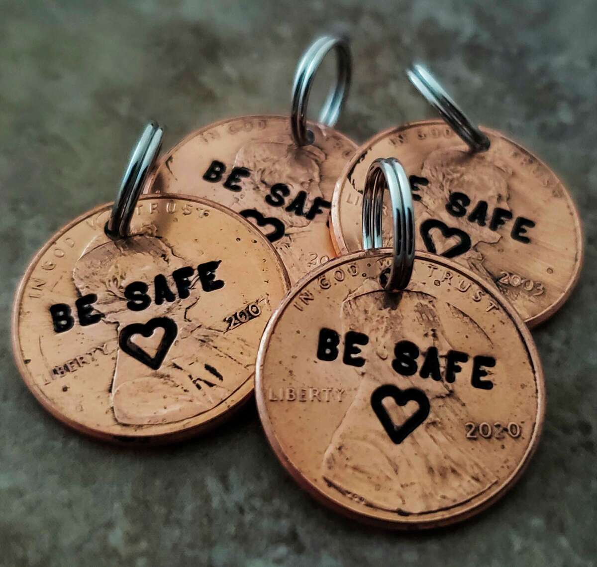 Stamped pennies made by Tiffany Demski of Auburn Hills, 10, are stamped with the message "Be safe." (Photo provided/Angee Demski)