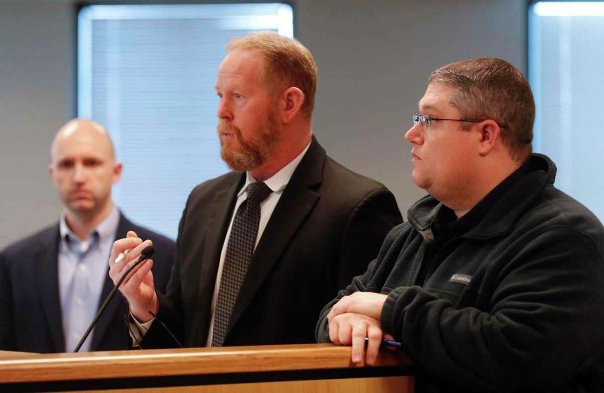 Darrin Hess, director of Montgomery County's Office of Homeland Security and Emergency Management, speaks beside MCOEM Executive Director Jason Millsaps, right, and Senior Planner Chris Perkins during a Montgomery County Commissioners Court meeting at Alan B. Sadler Commissioners Court building, Tuesday, Jan. 12, 2021, in Conroe.