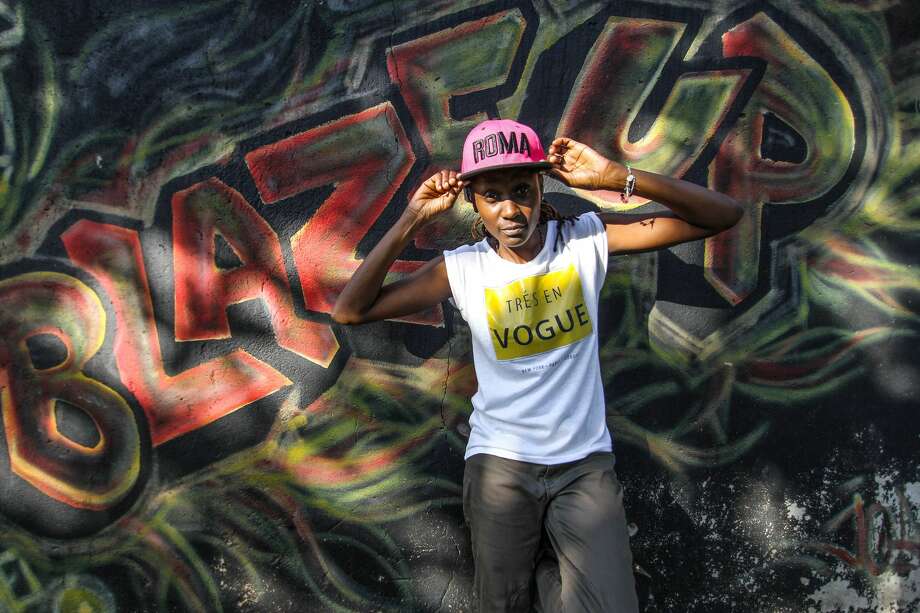 DJ Rachael standing against a graffitied wall on March 08, 2017 in Kampala, Uganda. Photo: Barcroft Media/Barcroft Media Via Getty Images / Sumy Sadurni / Barcroft Media