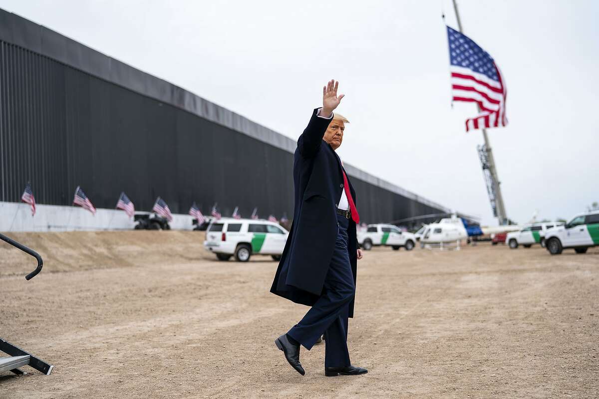 President Donald Trump waves while touring a portion of the border wall with Mexico, near Alamo, Texas, on Tuesday, Jan. 12, 2021. (Doug Mills/The New York Times)