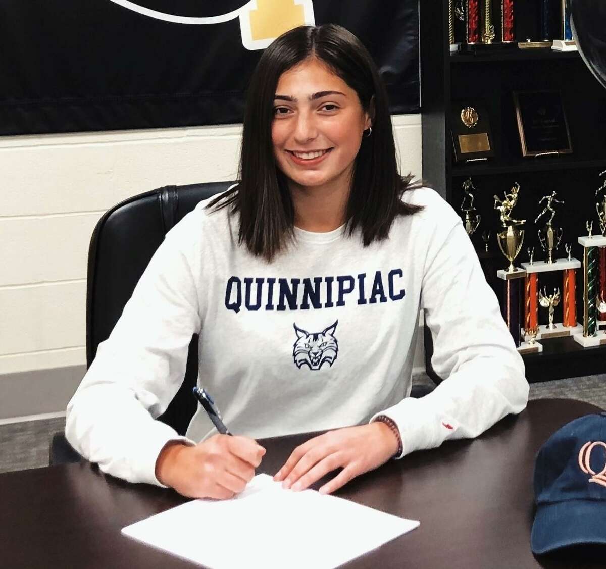 Ana Carlos signs her National Letter of Intent to play soccer at Quinnipiac University.