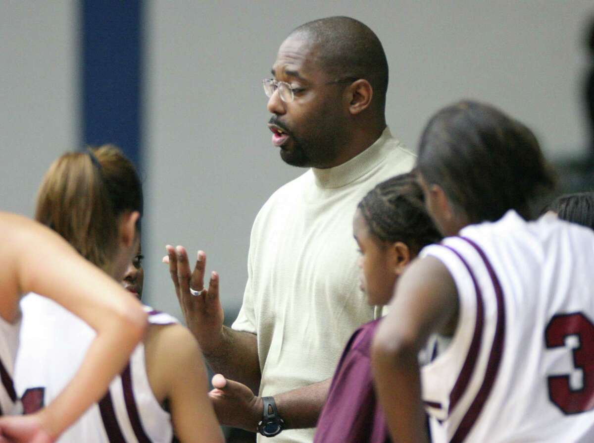 Kerrick Arrington is now the coach of the Heights Lady Bulldogs, who are still undefeated in district this year after defeating the Bellaire Lady Cardinals 57-44 at Delmar Stadium.