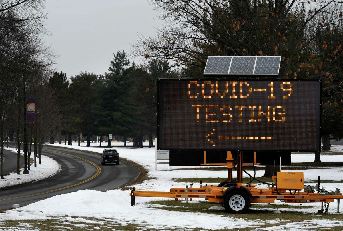 A sign on the University at Albany Campus informs drivers that of the state COVID-19 testing site on Wednesday, Jan. 13, 2021, in Albany, N.Y. (Will Waldron/Times Union)