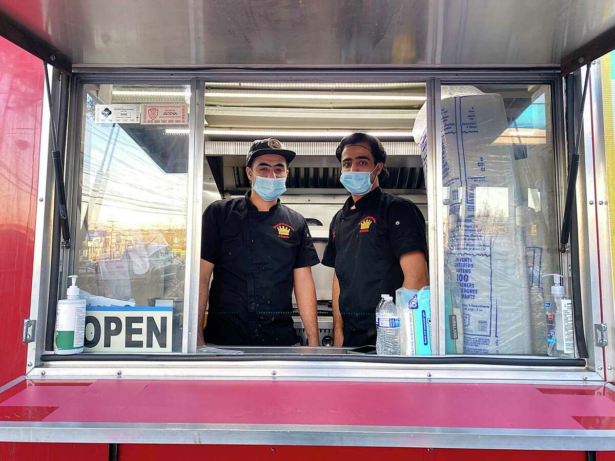 Brothers Ahmed Banna, left and Khedro Banna are part of the family that owns and operates King of Shawarma and Kabab, a Mediterranean food truck on Wurzbach Road.