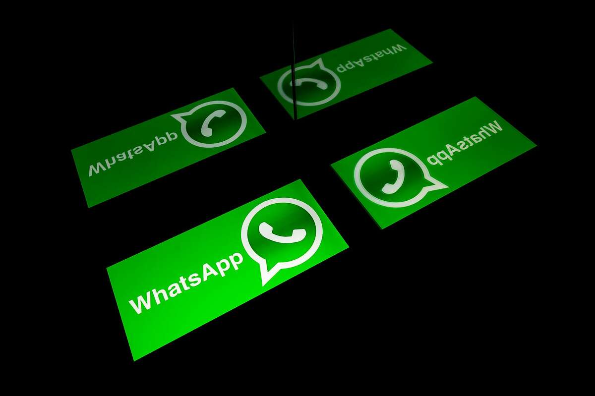 (FILES) This file photo taken on October 5, 2020 shows the logo of mobile messaging service WhatsApp on a tablet screen in Toulouse, southwestern France. (Photo by Lionel BONAVENTURE / AFP) (Photo by LIONEL BONAVENTURE/AFP via Getty Images)