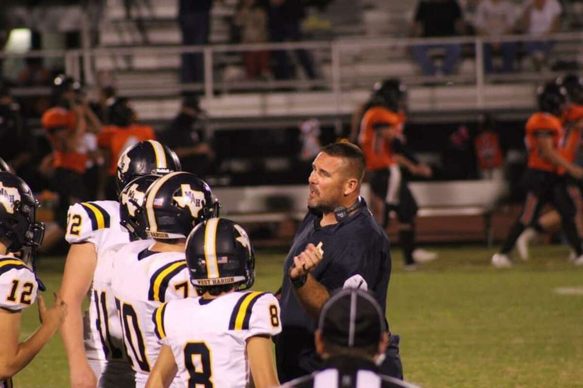 West Hardin Oilers head football coach George Taylor giving instructions to his team during its loss against Warren on Friday, Sept. 11, 2020 in Warren, TX.