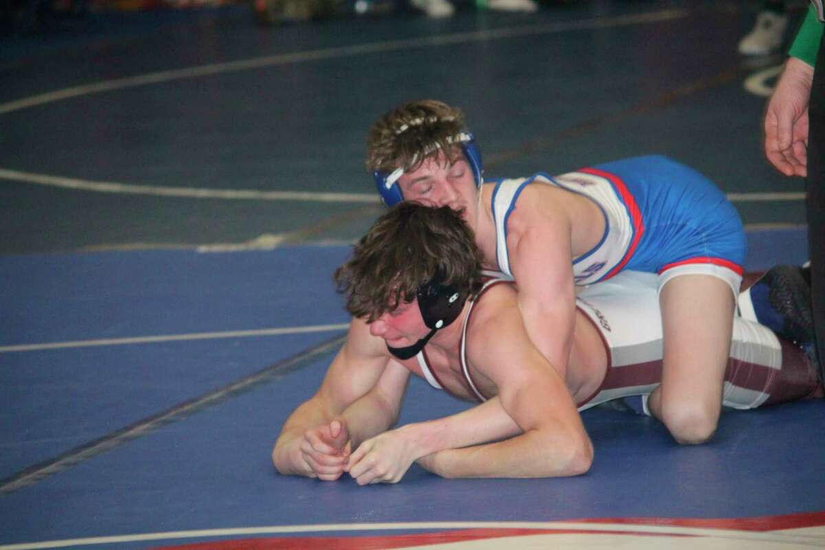 Carson Hayes (top) is expected to be among the area's top wrestlers this season. (Pioneer file photo)