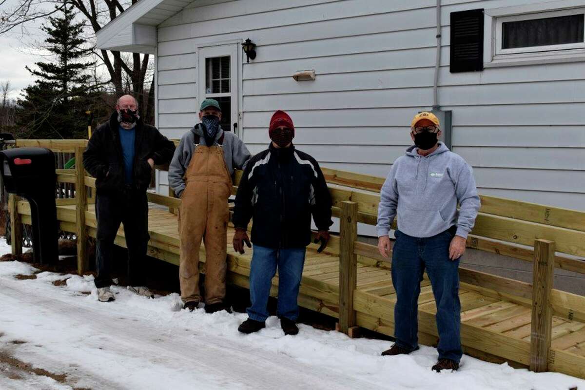 Habitat for Humanity Benzie Site Selection and Construction Committee members (from left to right) Don Bridges, Steve VanDePere, Bill Frostic and Glen Tracy, recently constructed a ramp for the widow of a WWII veteran. (Courtesy Photo)
