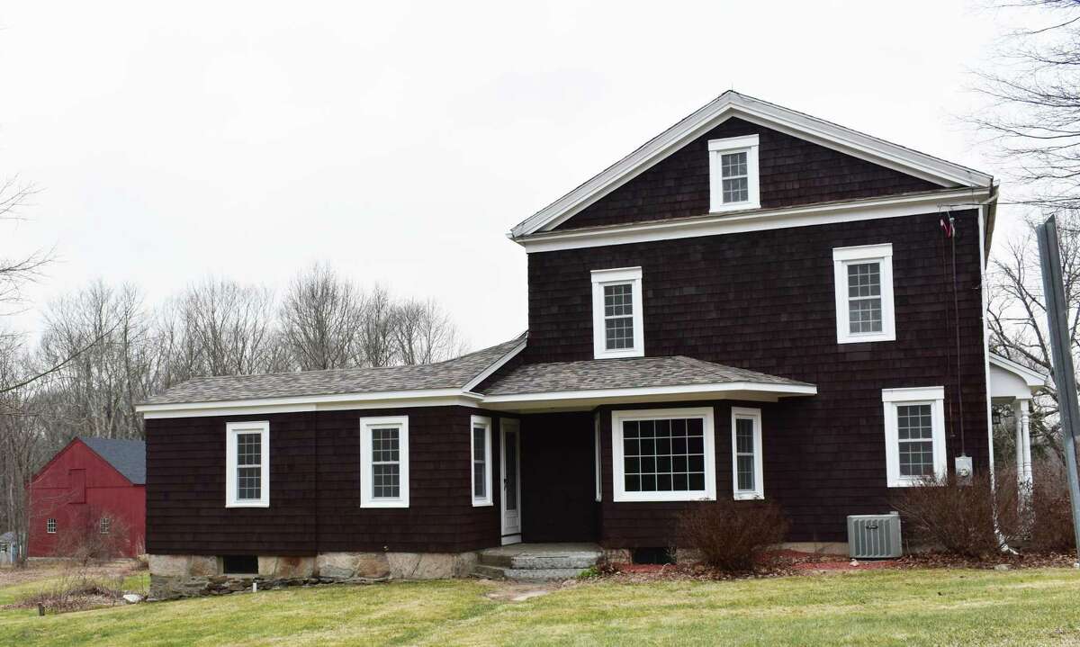 A Sport Hill Road home in Easton, Conn., which went under contract for its asking price of more than $500,000 11 days after it was listed in December 2020. Fairfield County had a boom year for real estate, with sales up more than 30 percent and more listings coming on the market in the first few weeks of January 2021.