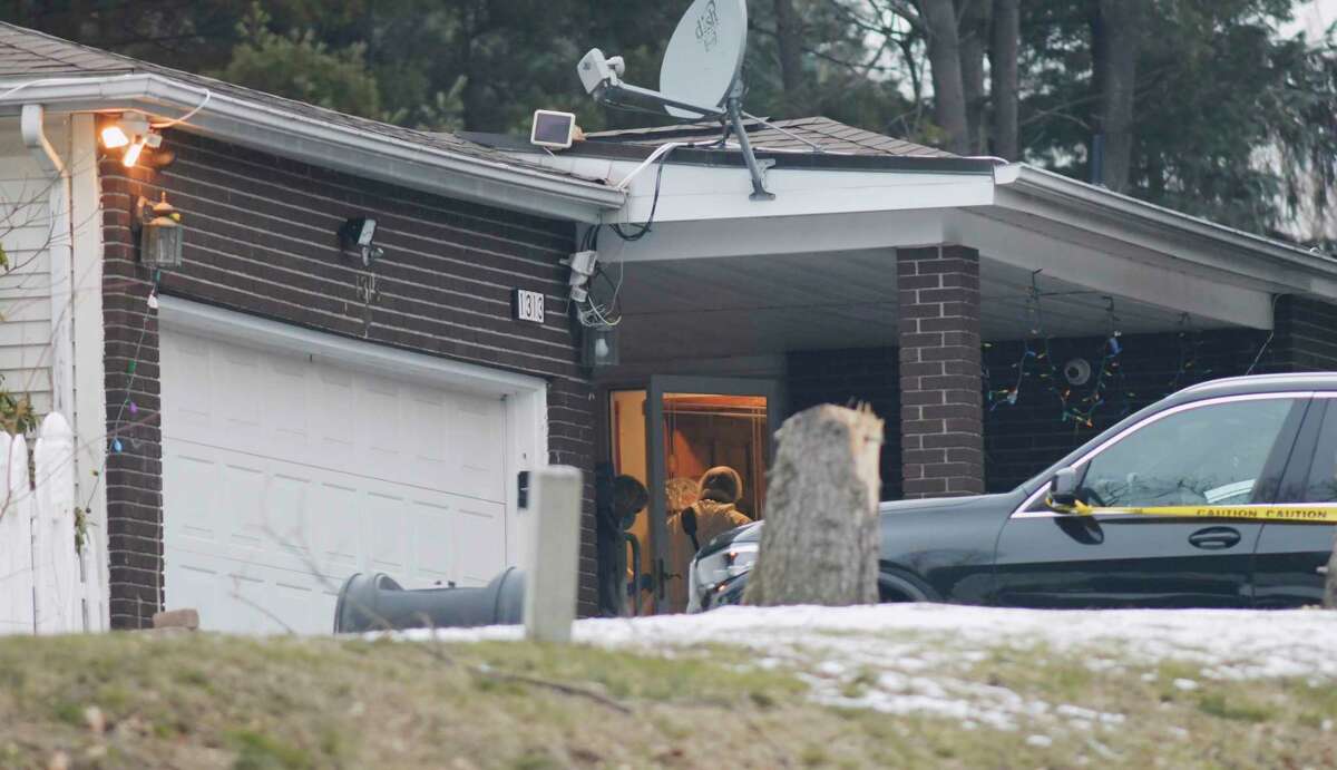 Police are investigating killings that took place at a home located at 1313 Angelo Drive on Thursday, Jan. 14, 2021, in Schodack, N.Y. State Police said an assailant killed two people before committing suicide. Another victim was being treated for a non-life-threatening gunshot wound, troopers said.(Paul Buckowski/Times Union)