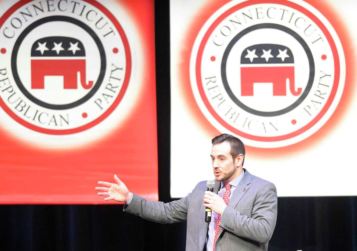 JR Romano, Connecticut Republican Party Chairman welcomes attendees to the Connecticut 4th District GOP Debate featuring candidates for Governor at Saxe Middle School in New Canaan, Conn. on April 18, 2018.