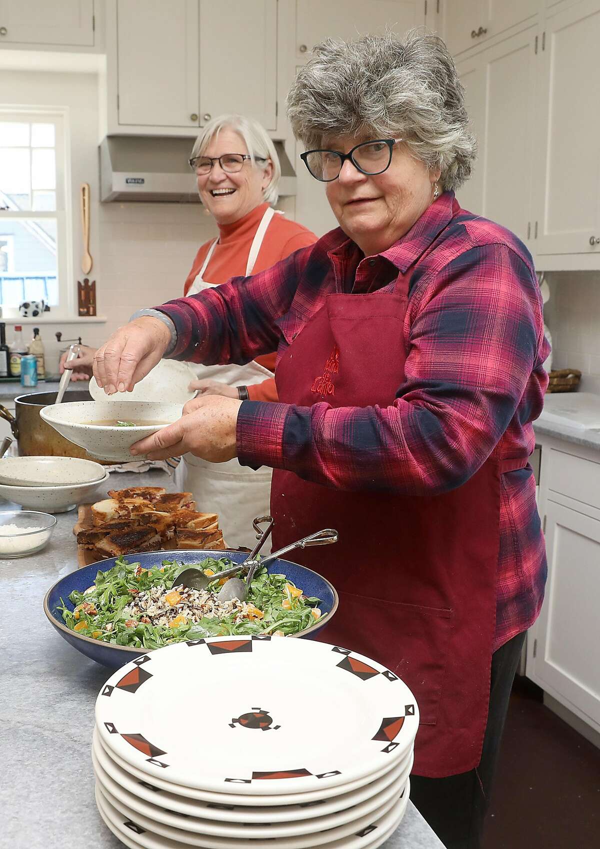 Sue Conley, right, and co-founder Peggy Smith make brunch in Petaluma.