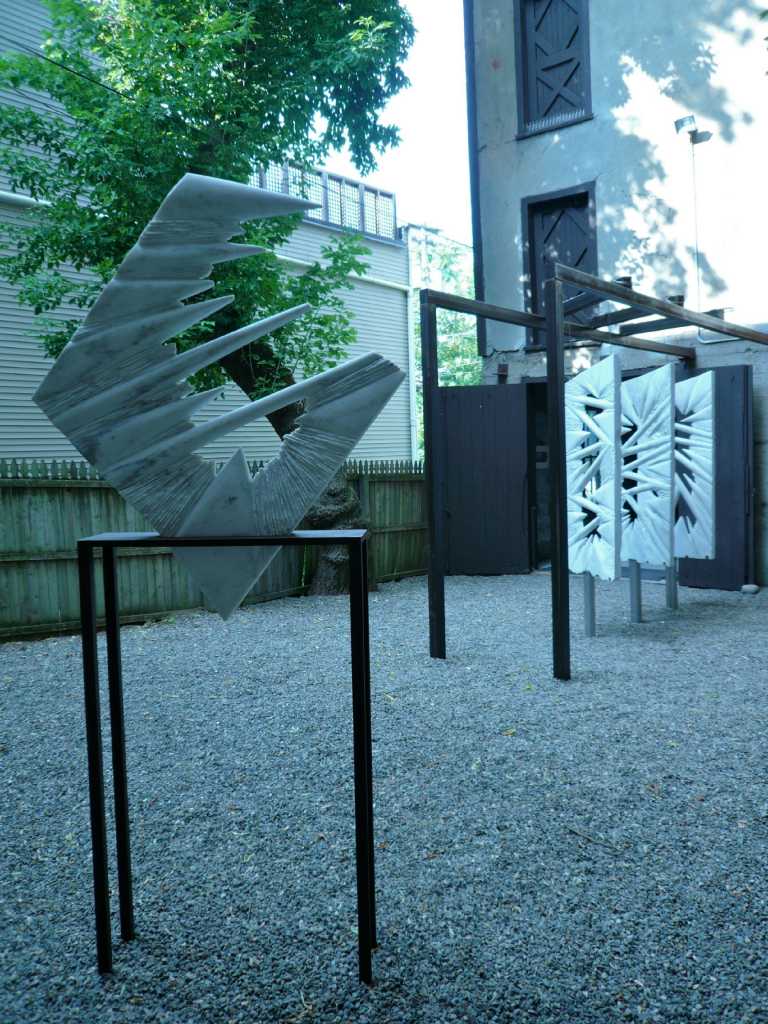 Sculptor turns icy inspiration to marble reality