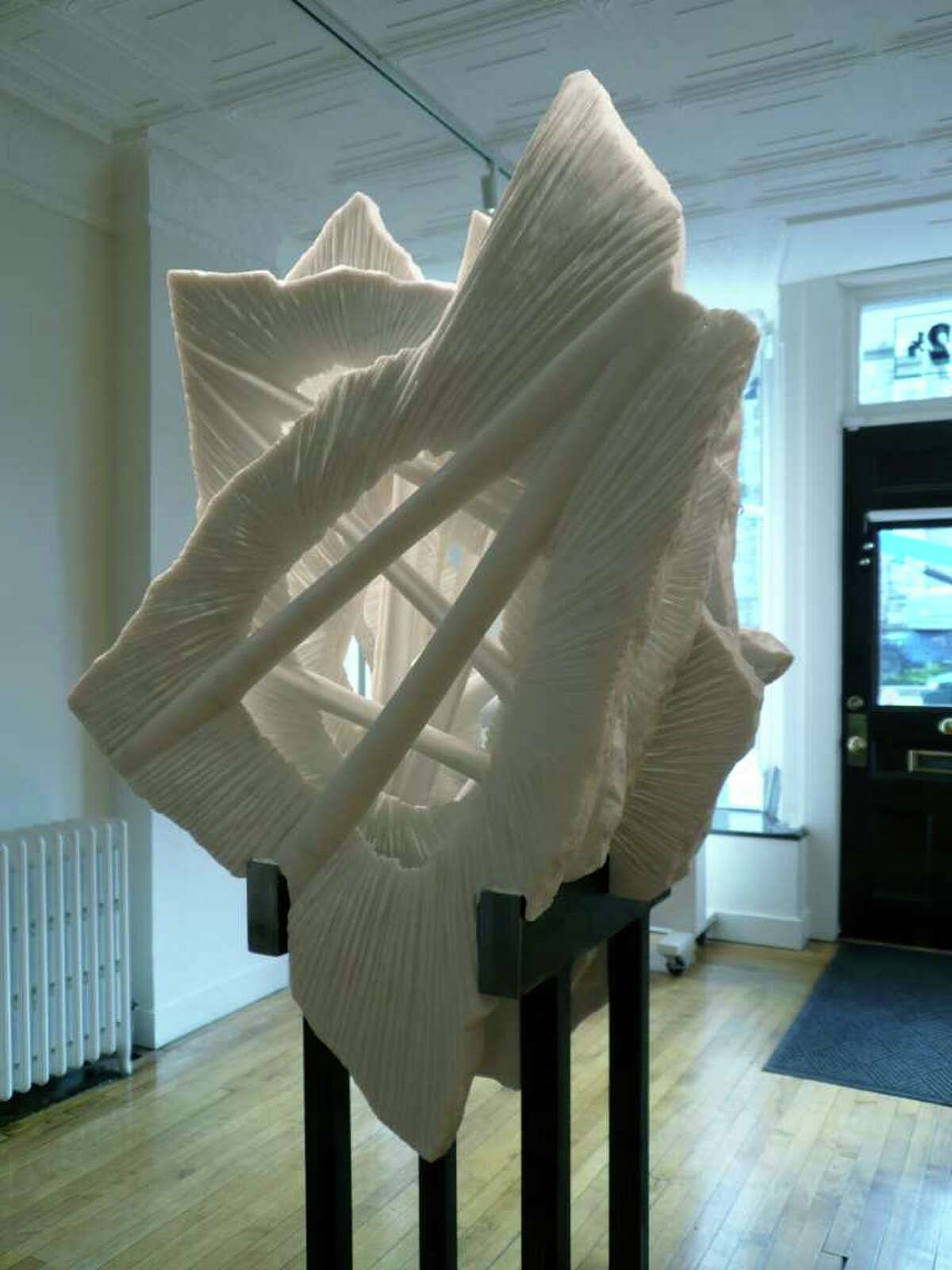 Sculptor turns icy inspiration to marble reality