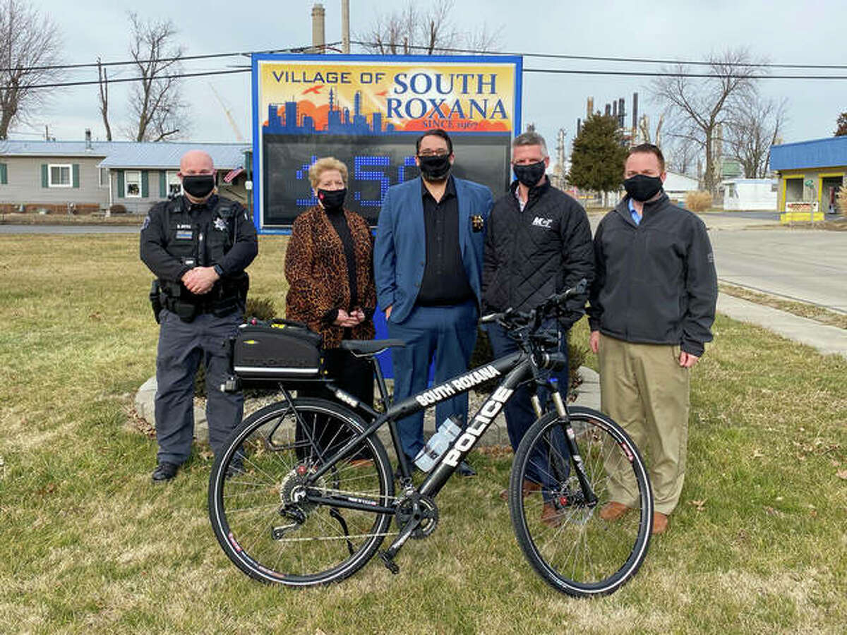 Madison County Transit has donated iForce police bicycles to the Troy and South Roxana Police Departments. Pictured at the South Roxana Village Hall are, from left, South Roxana Police Lt. Brian Doyle, South Roxana Mayor Barb Overton, South Roxana Police Chief Bob Coles, MCT Managing Director SJ Morrison and MCT GIS Specialist David Cobb.