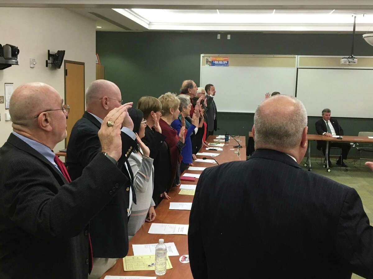 The Branford RTM is sworn in by Town Clerk Lisa Arpin Tuesday night, Nov. 19, 2019 in this file photo.