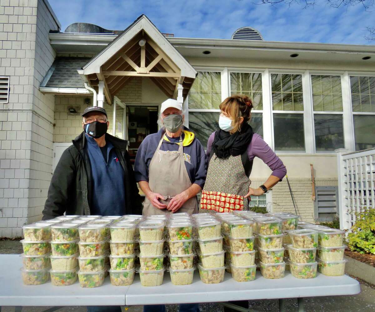 FILE: Greek Olive owner Tony Antonakis after delivering 150 Bowls of Hope to the Community Dining Room, with volunteer Tony Lattimore (center) and CDR kitchen coordinator Mary Johnston