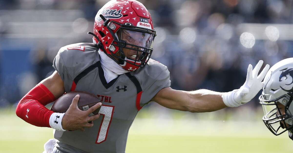 Cedar Hill High School quarterback Kaidon Salter (7) uses a stiff arm on a run during the first half as Denton Guyer High School played Cedar Hill High School in the Class 6A Division II, state semifinal at McKinney ISD Stadium in McKinney on Saturday, January 9, 2021. (Stewart F. House/Special Contributor)