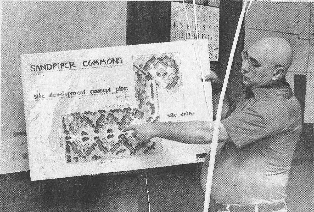 From the Jan. 16, 1981 front page of the Manistee News Advocate, City Assessor Jerry Superczynski points to a site development concept plan for Sandpiper Commons, a proposed 90-unit townhouse and condominium complex to be located at the corner of First and Cherry Street. (Manistee County Historical Museum photo)