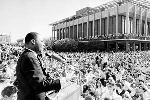Civil rights leader Reverend Martin Luther King, Jr. delivers a speech to a crowd of approximately 7,000 people on May 17, 1967 at UC Berkeley's Sproul Plaza in Berkeley, California. (Photo by Michael Ochs Archives/Getty Images)