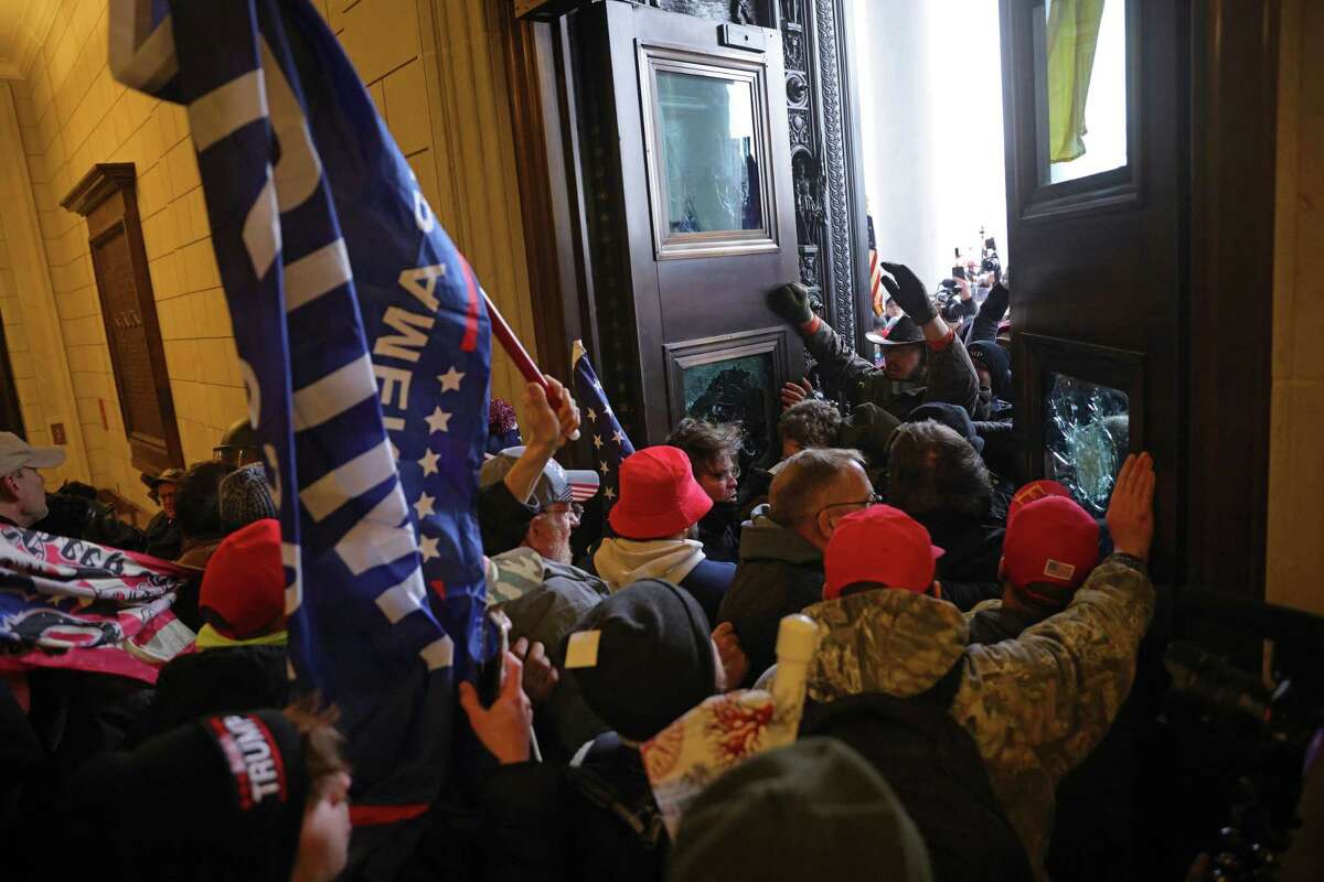 Protesters supporting President Donald Trump break into the U.S. Capitol on Jan. 6, 2021