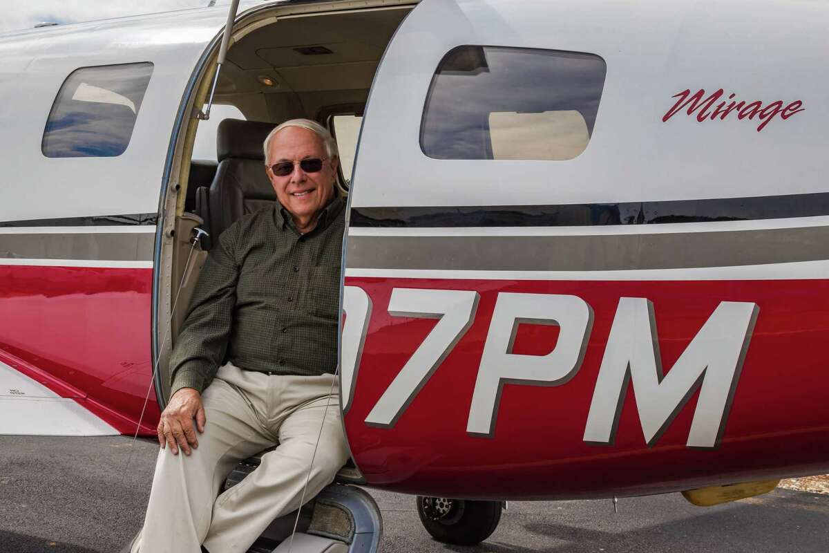 Angel Flight volunteer pilot Stephen Wright with his beloved Piper Malibu Mirage.
