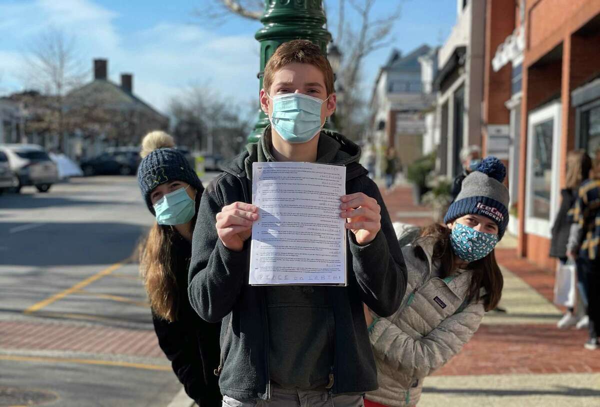 People complete a scavenger hunt in New Canaan.