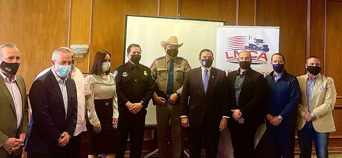 Pictured is Rep. Cuellar with CBP Deputy Director Albert Flores, Sergeant Genaro Hinojosa and other State Troopers as well as members of Laredo Motor Carriers Association.