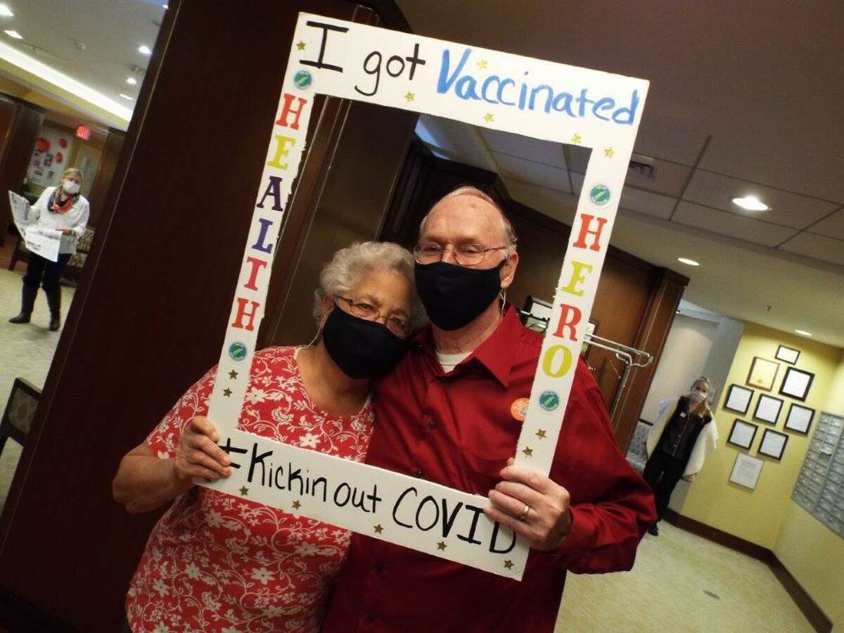 Benchmark Senior Living at Split Rock residents Leo and Delloroise Fortier after receiving the COVID-19 vaccine on Wednesday, Jan. 13.