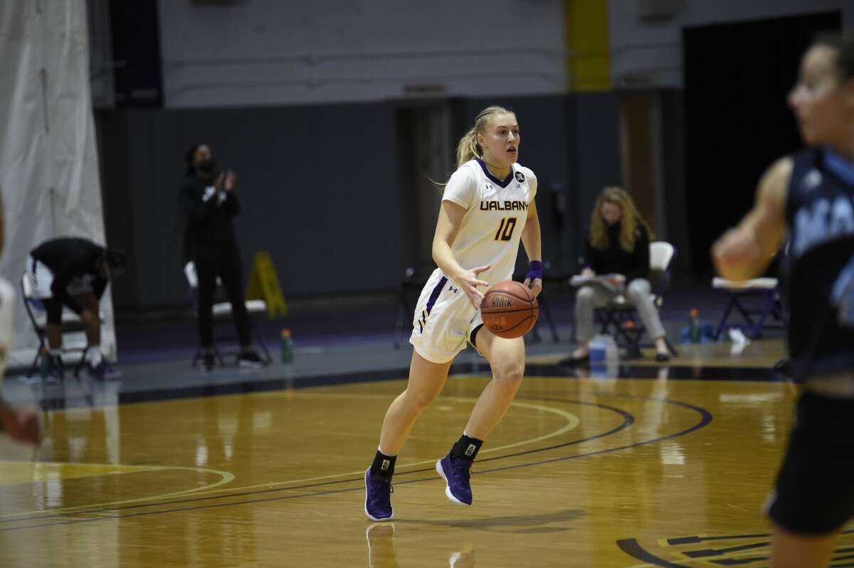 East Greenbush native Grace Heeps brings the ball upcourt for UAlbany in an America East women's basketball game against Maine on Saturday, Jan. 16, 2021, at SEFCU Arena in Albany. (Kathleen Helman/UAlbany athletics)