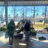 Shoppers buying local fresh produce at the Beaumont Farmers' market on Saturday, Jan. 16, 2021 at the Beaumont Athletic Complex in Beaumont, TX. The Enterprise/ Ramos