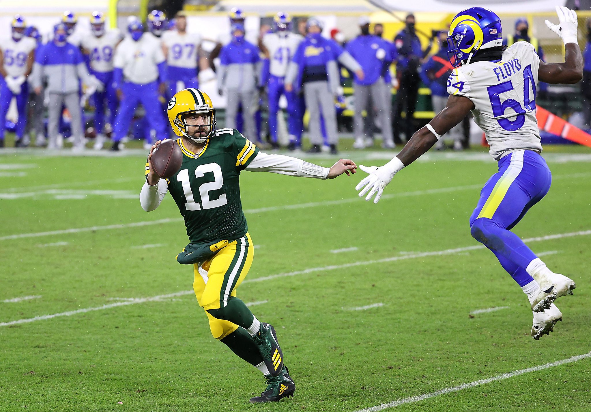 Rodgers, Packers beat Rams, 32-18, to reach NFC title game