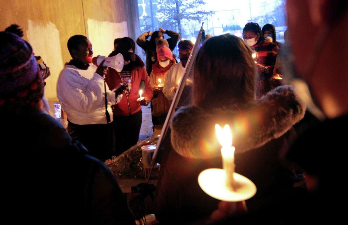 A vigil is held in memory of Mubarak Soulemane at the I95 overpass along Campbell Avenue in West Haven, Conn., on Friday Jan. 15, 2021. Soulemane, a New Haven resident, was fatally shot by state Trooper Brian North after a car chase on Jan. 15, 2020.