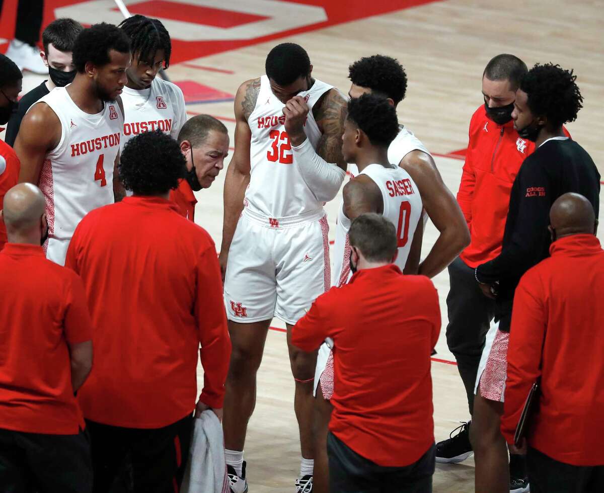 Houston Cougars head coach Kelvin Sampson talks to the team during a time out during the first half of a men’s NCAA basketball game at the Fertitta Center, in Houston, Sunday, Jan. 17, 2021.