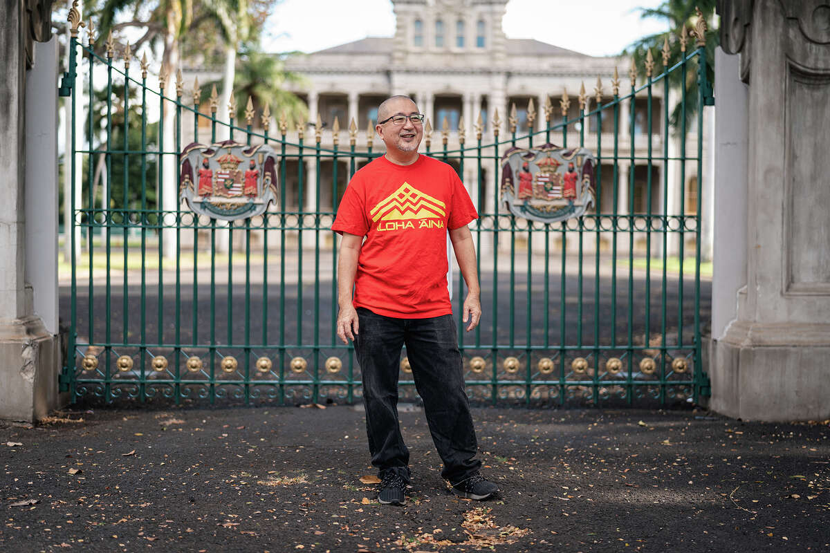 Kyle Kajihiro stands in front of royal residence Iolani Palace in Honolulu, Hawaii, Jan. 13, 2021.