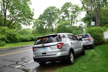 A file photo of Connecticut State Police cruisers participating in a search back in 2019 linked to the disappearance of Jennifer Dulos.