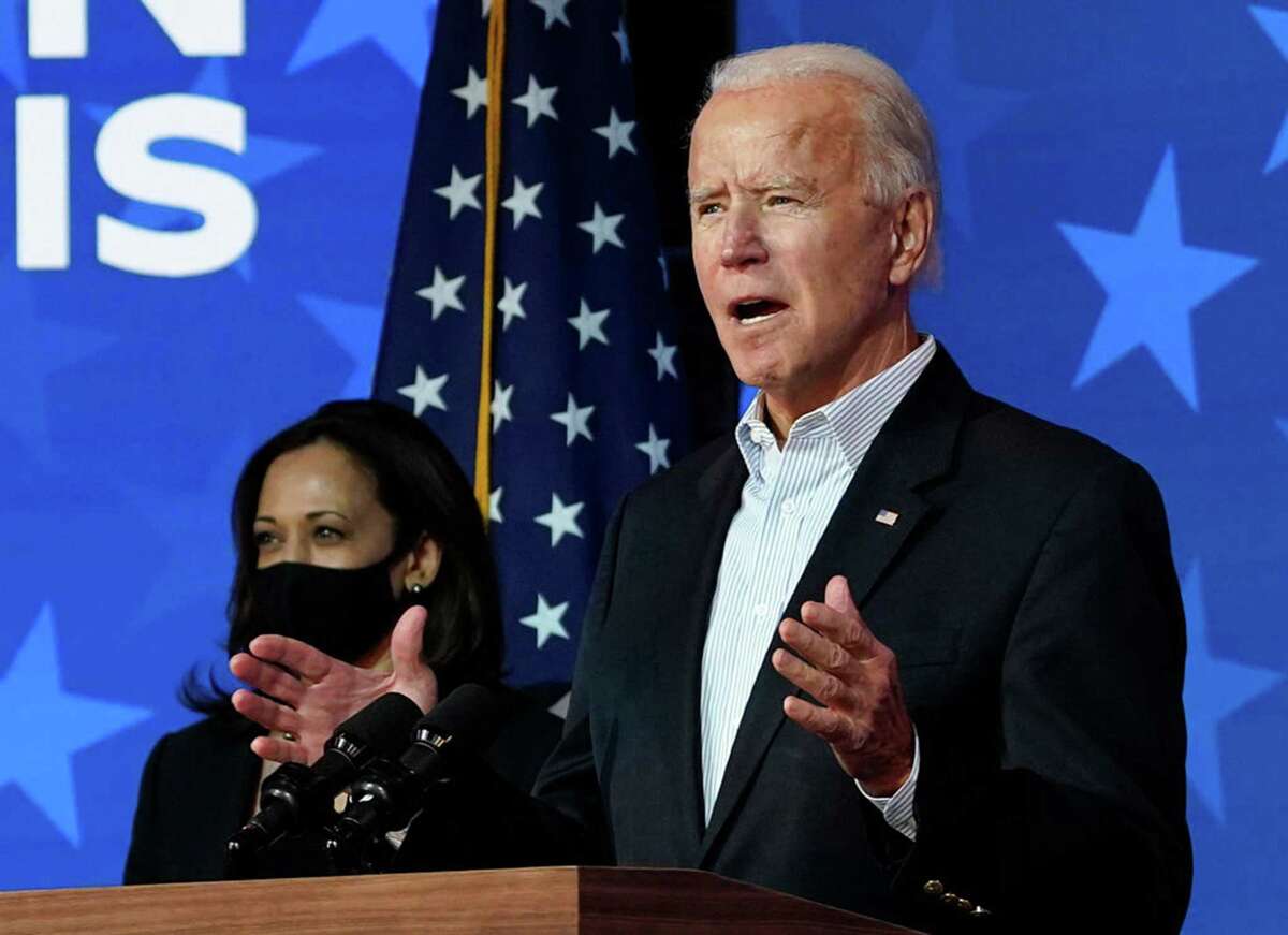 Joe Biden and Kamala Harris at The Queen theater on Thursday, Nov. 5, 2020, in Wilmington, Delaware. (Drew Angerer/Getty Images/TNS)