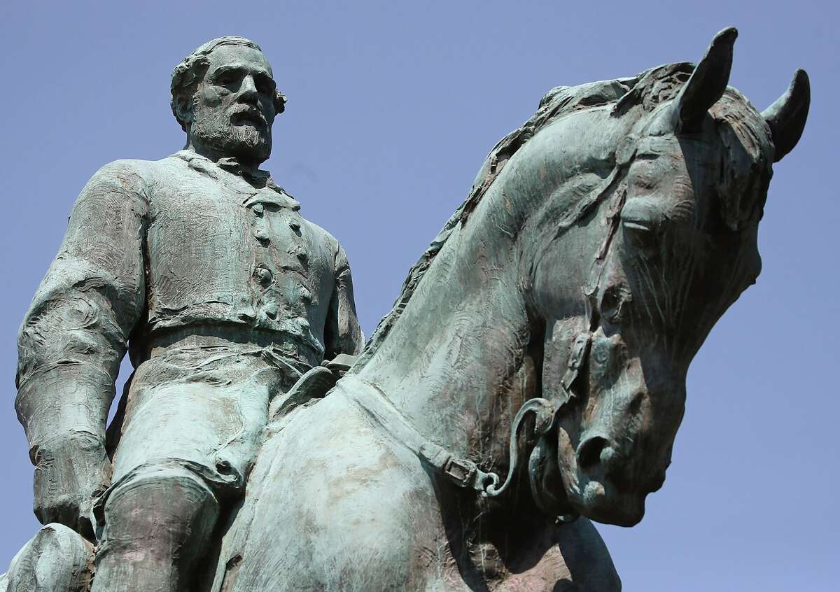 The statue of Confederate Gen. Robert E. Lee stands in the center of the renamed Emancipation Park on August 22, 2017 in Charlottesville, Virginia. A decision to remove the statue caused a violent protest by white nationalists, neo-Nazis, the Ku Klux Klan and members of the 'alt-right'.