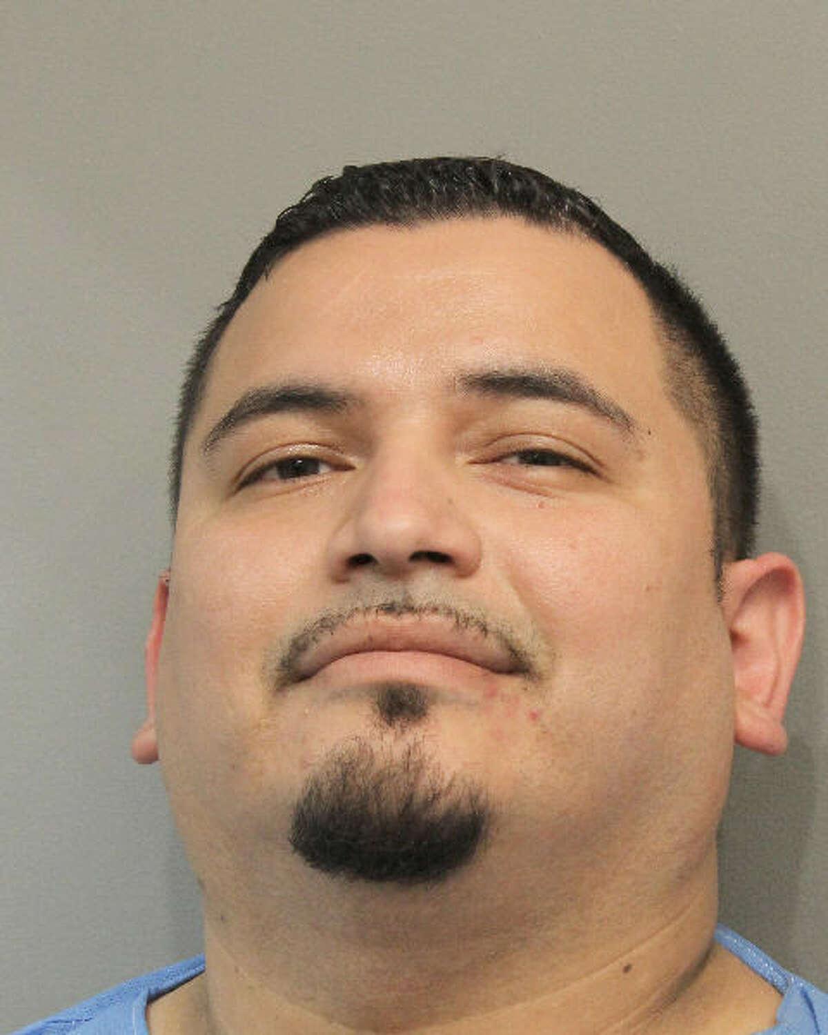 Angel Galvan is charged with burglary in connection with a Saturday shootout with a Cypress homeowner.